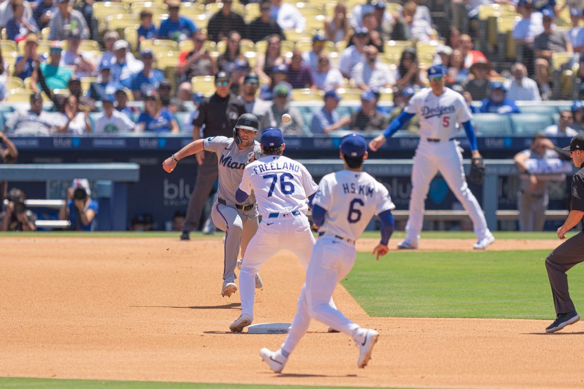 Los Angeles Dodgers infielder Alex Freeland (76) tagging second for an out during an MLB baseball game against the Miami Marlins on April 29th, 2026 in Los Angeles, CA.