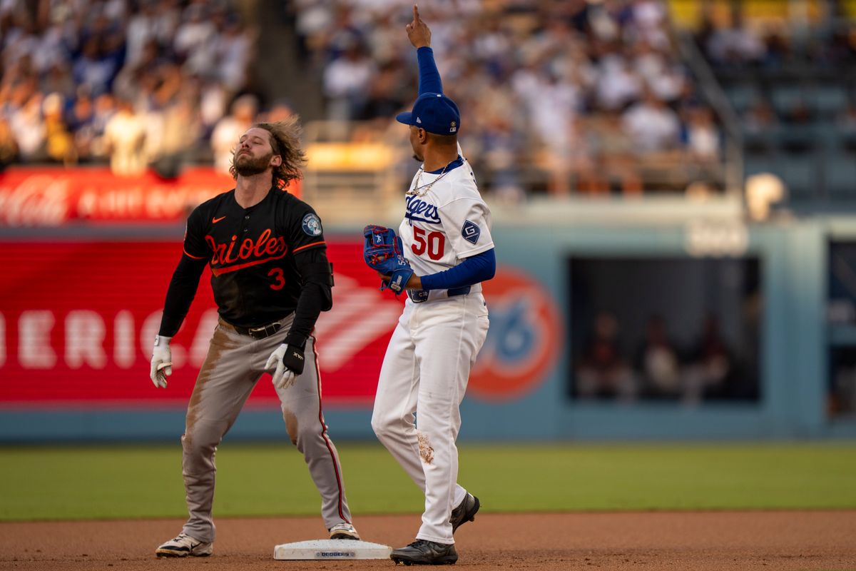 Los Angeles Dodgers infielder Mookie Betts (50) celebrating an out at second base during an MLB baseball game against the Baltimore Orioles on June 19th, 2026 in Los Angeles, CA.