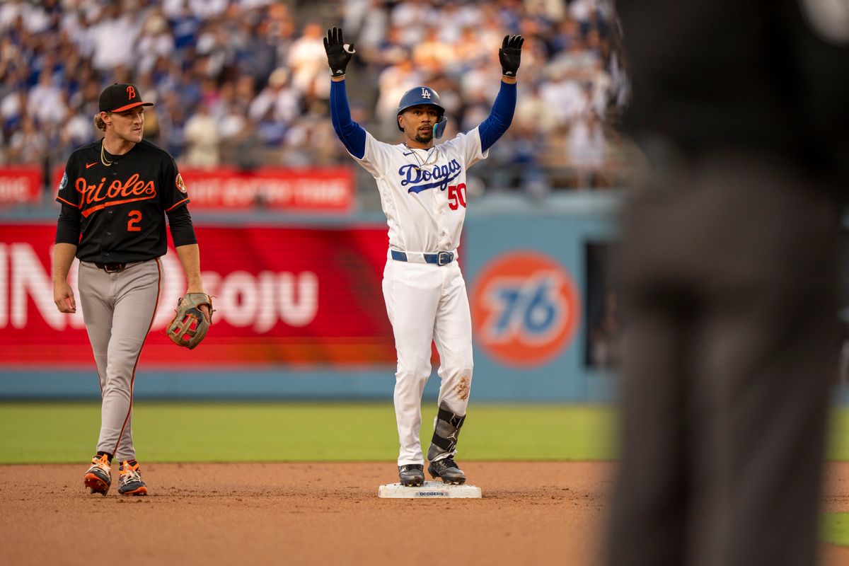 Los Angeles Dodgers infielder Mookie Betts (50) celebrating hitting a double during an MLB baseball game against the Baltimore Orioles on June 19th, 2026 in Los Angeles, CA.