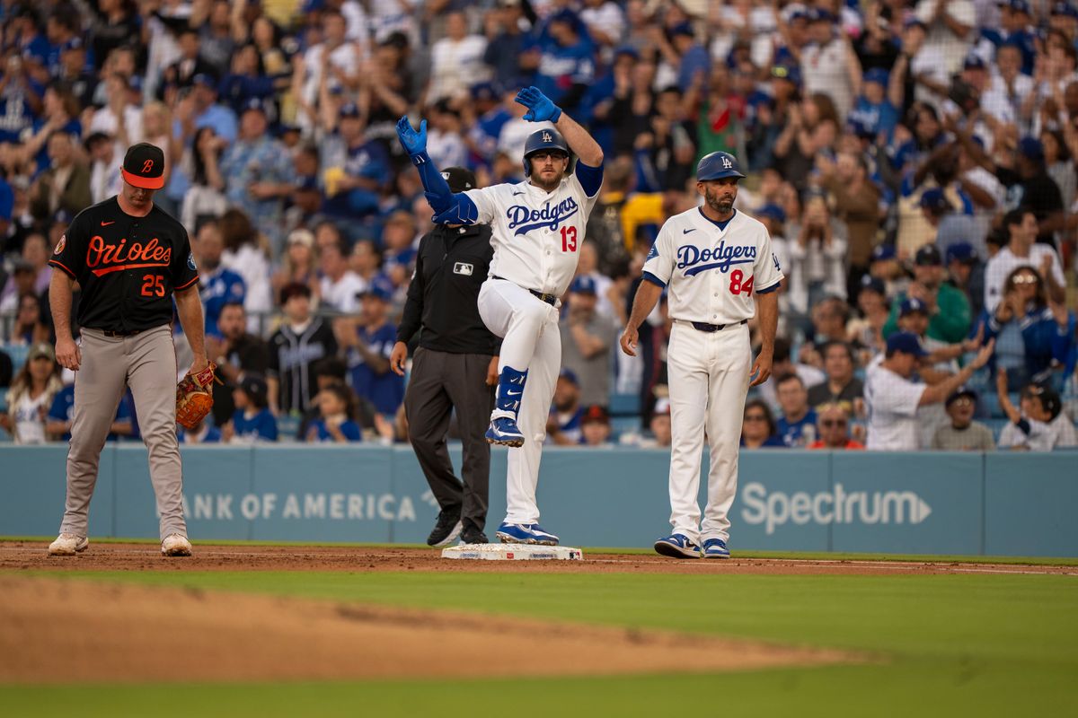 Los Angeles Dodgers infielder Max Muncy (13) celebrating a hit during an MLB baseball game against the Baltimore Orioles on June 19th, 2026 in Los Angeles, CA.