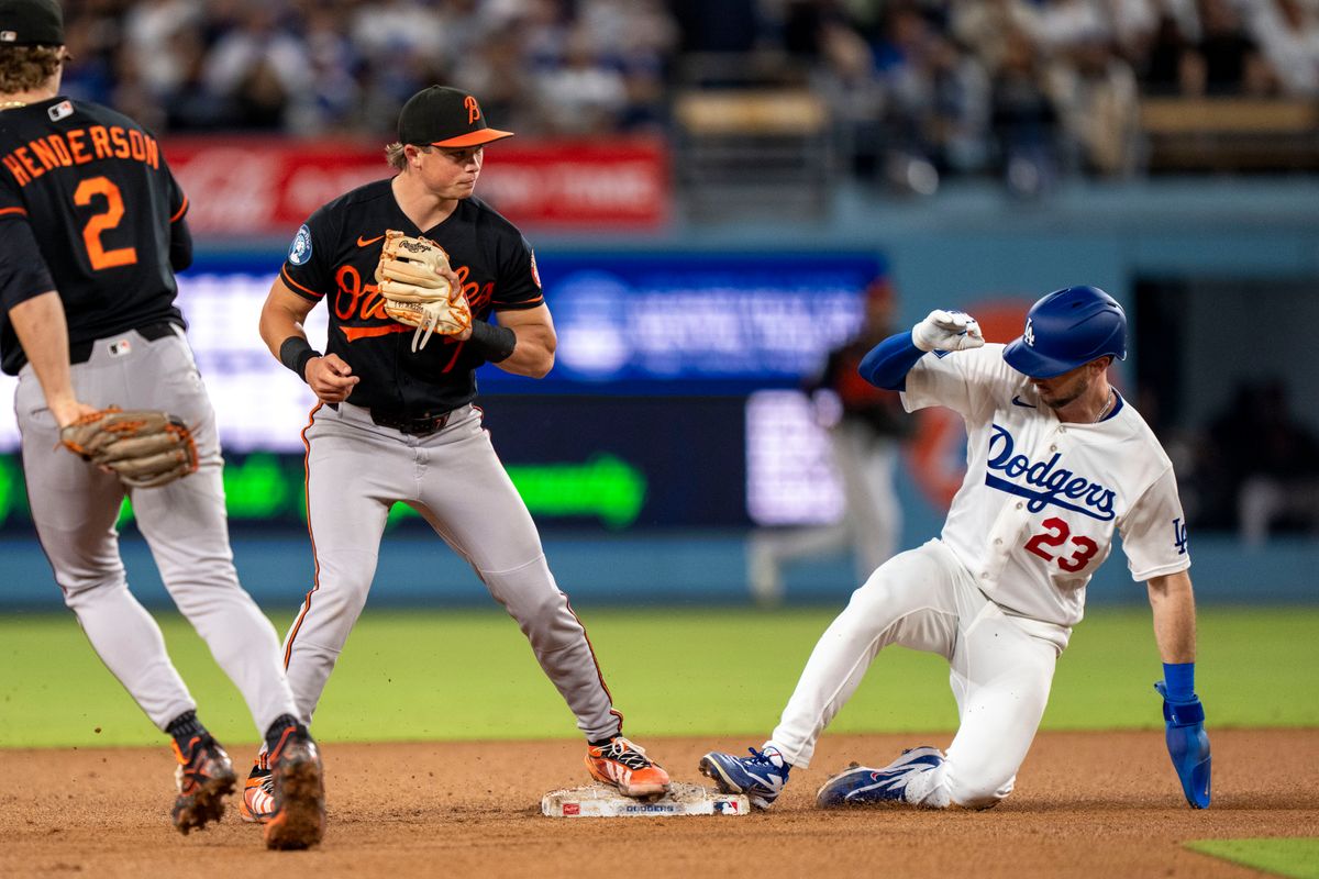 Los Angeles Dodgers outfielder Kyle Tucker (23) is tagged out at second during an MLB baseball game against the Baltimore Orioles on June 19th, 2026 in Los Angeles, CA.