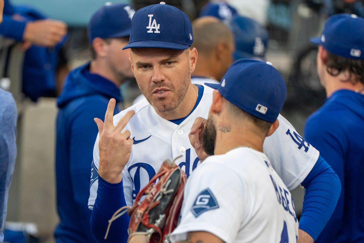 Los Angeles Dodgers infielder Freddie Freeman (5) celebrating in the dugout with Andy Pages during an MLB baseball game against the Baltimore Orioles on June 19th, 2026 in Los Angeles, CA.