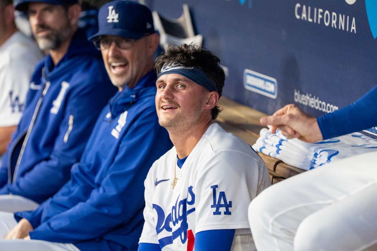 Los Angeles Dodgers infielder Alex Freeland (76) reacts to a review calling him safe at home plate during an MLB baseball game against the Baltimore Orioles on June 19th, 2026 in Los Angeles, CA.
