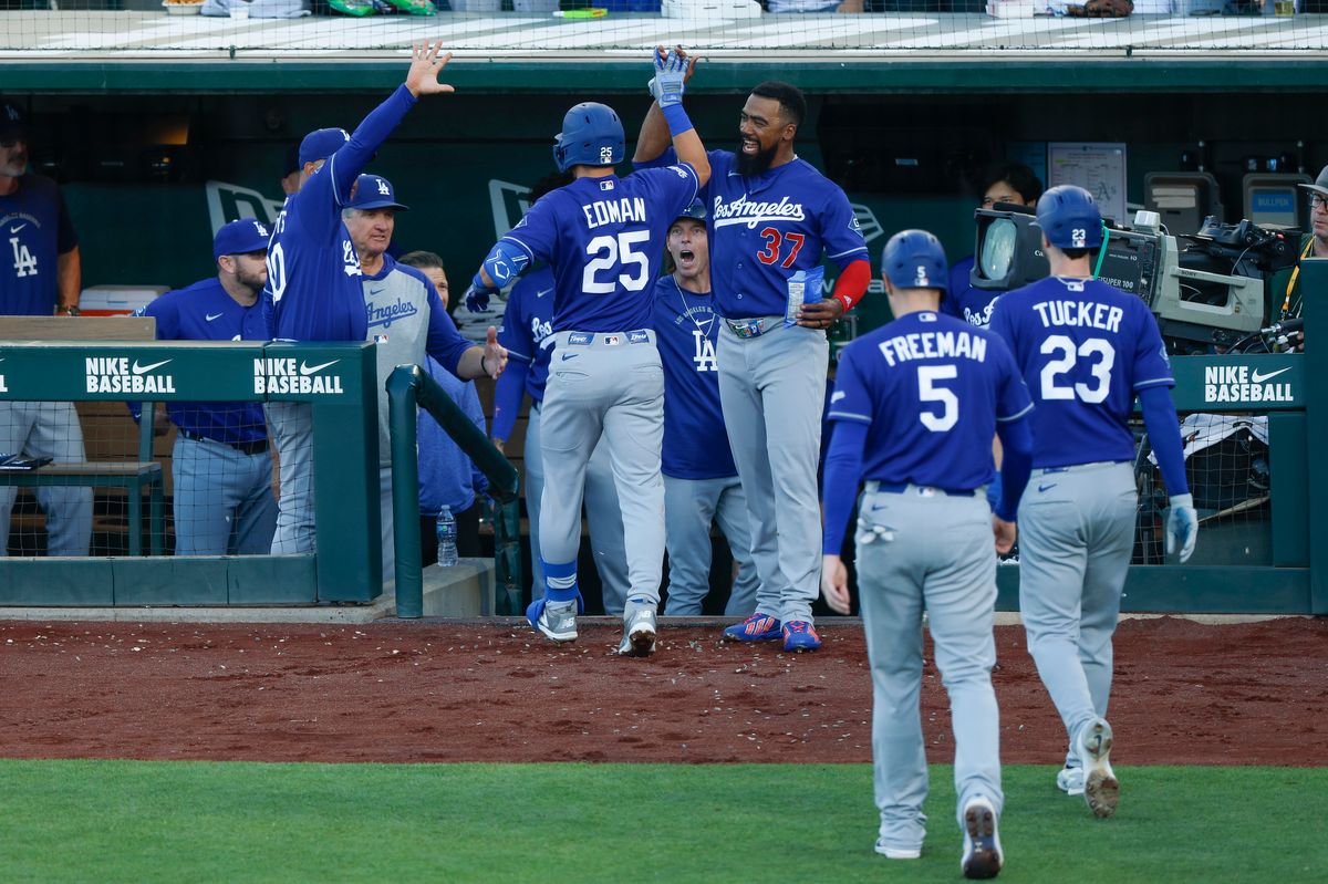 Tommy Edman #25 of the Los Angeles Dodgers celebrates his three-run home run against the Athletics at Sutter Health Park on June 30, 2026 in Sacramento, California.