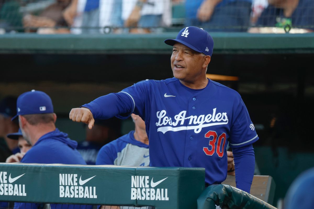 Dave Roberts #30 of the Los Angeles Dodgers in the dugout against the Athletics at Sutter Health Park on July 1, 2026 in Sacramento, California. Dave Roberts #30 of the Los Angeles Dodgers in the dugout against the Athletics at Sutter Health Park on July 1, 2026 in Sacramento, California.