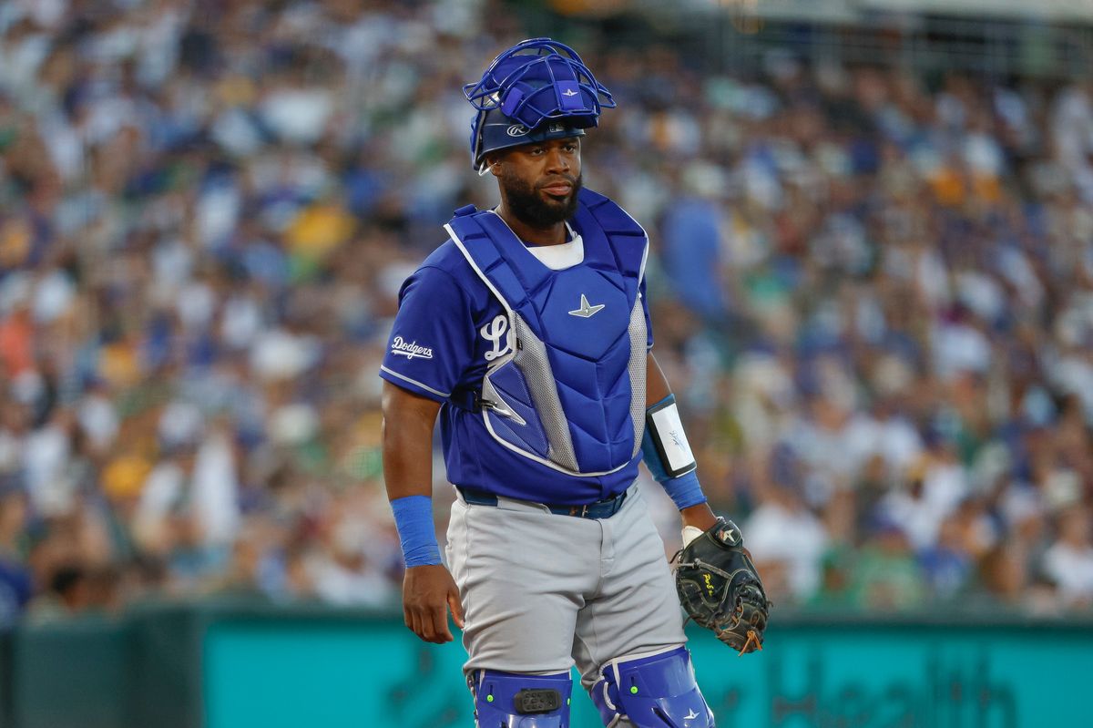 Chuckie Robinson #52 of the Los Angeles Dodgers looks on against the Athletics at Sutter Health Park on July 1, 2026 in Sacramento, California. Chuckie Robinson #52 of the Los Angeles Dodgers looks on against the Athletics at Sutter Health Park on July 1, 2026 in Sacramento, California.