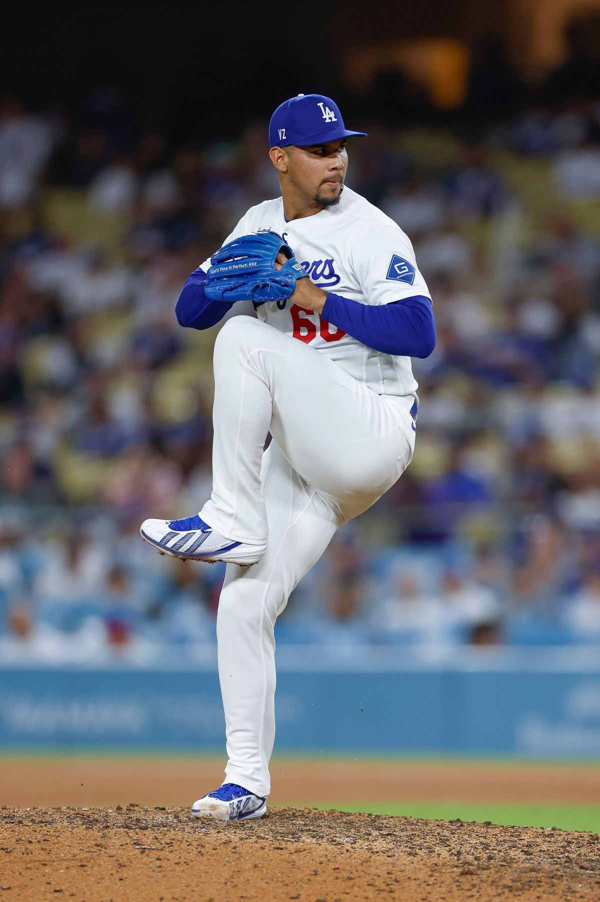 Edgardo Henriquez #60 of the Los Angeles Dodgers pitches against the Colorado Rockies at Dodger Stadium on July 06, 2026 in Los Angeles, California. Edgardo Henriquez #60 of the Los Angeles Dodgers pitches against the Colorado Rockies at Dodger Stadium on July 06, 2026 in Los Angeles, California.