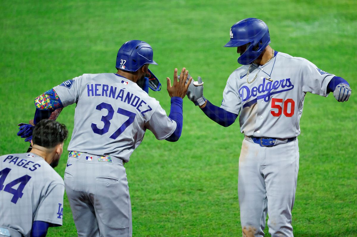 Mookie Betts #50 of the Los Angeles Dodgers celebrates a home run against the Philadelphia Phillies at Citizens Bank Park on July 20, 2026 in Philadelphia, Pennsylvania.