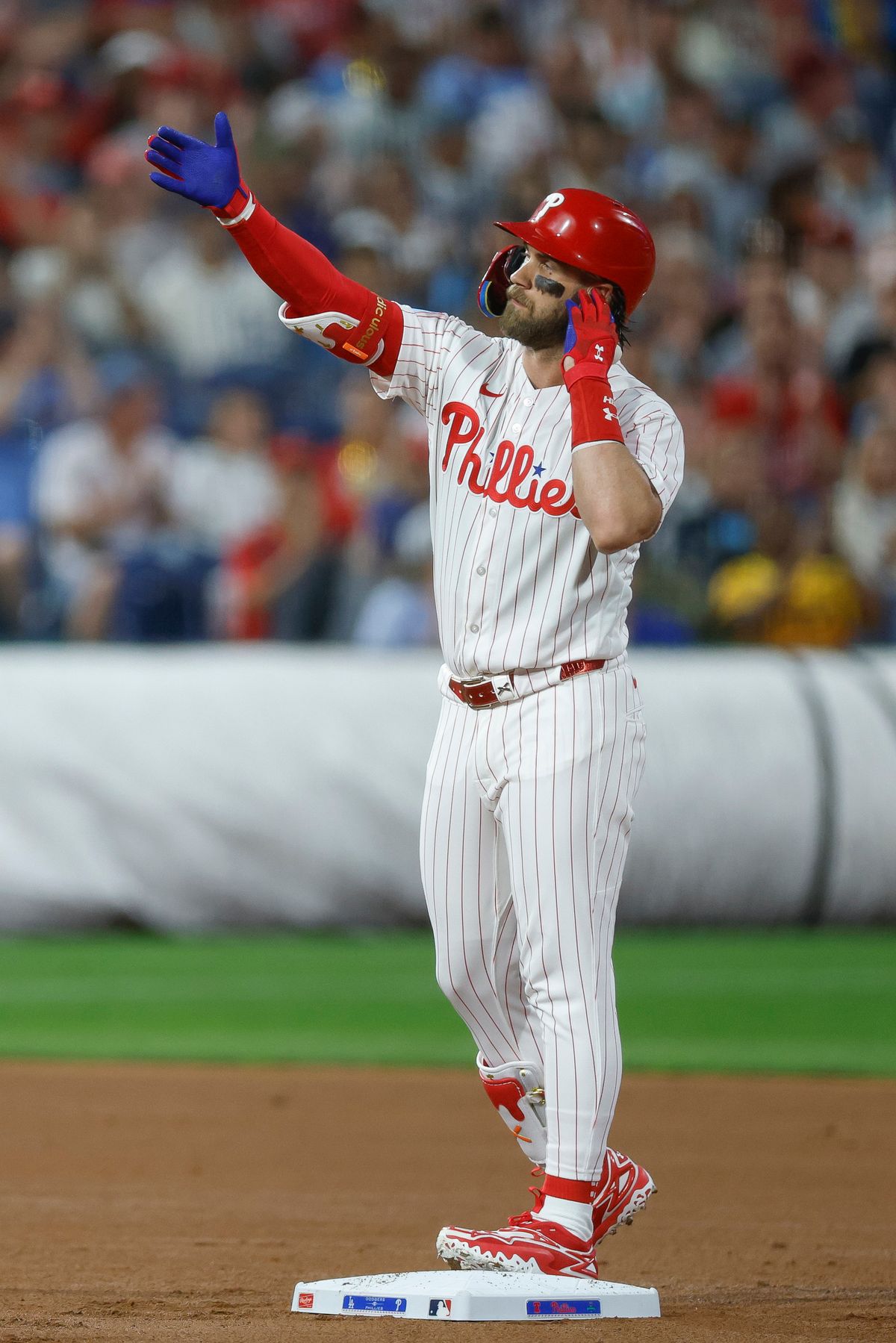 Bryce Harper #3 of the Philadelphia Phillies celebrates at second base against the Los Angeles Dodgers at Citizens Bank Park on July 21, 2026 in Philadelphia, Pennsylvania. Bryce Harper #3 of the Philadelphia Phillies celebrates at second base against the Los Angeles Dodgers at Citizens Bank Park on July 21, 2026 in Philadelphia, Pennsylvania.