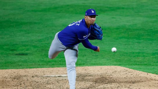 Edgardo Henriquez #60 of the Los Angeles Dodgers throws a pitch against the Philadelphia Phillies at Citizens Bank Park on July 22, 2026 in Philadelphia, Pennsylvania.