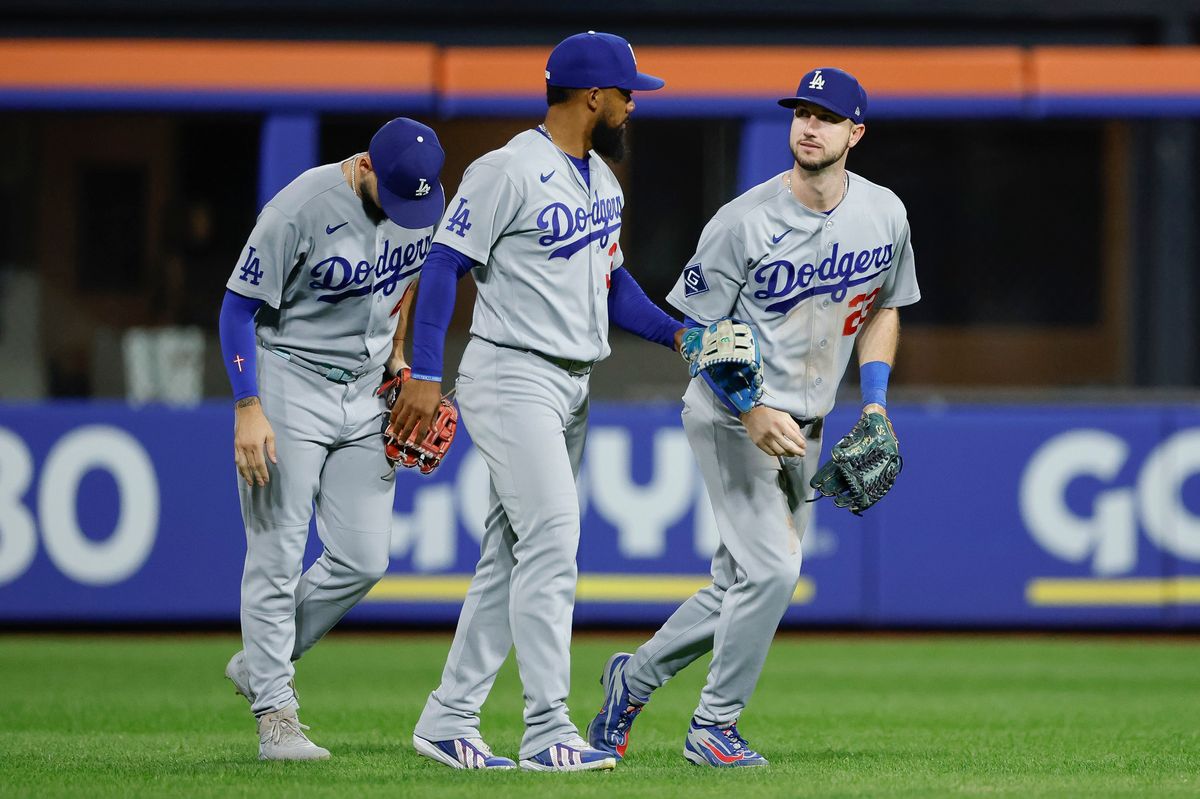 Kyle Tucker #23, Teoscar Hernandez #37, and Andy Pages #44 of the Los Angeles Dodgers celebrates a team victory over the New York Mets at Citi Field on July 24, 2026 in New York, New York. Kyle Tucker #23, Teoscar Hernandez #37, and Andy Pages #44 of the Los Angeles Dodgers celebrates a team victory over the New York Mets at Citi Field on July 24, 2026 in New York, New York.