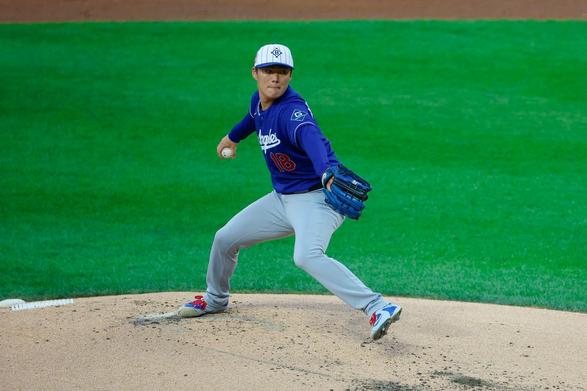Yoshinobu Yamamoto #18 of the Los Angeles Dodgers pitches against the New York Mets at Citi Field on July 25, 2026 in New York, New York. Yoshinobu Yamamoto #18 of the Los Angeles Dodgers pitches against the New York Mets at Citi Field on July 25, 2026 in New York, New York.