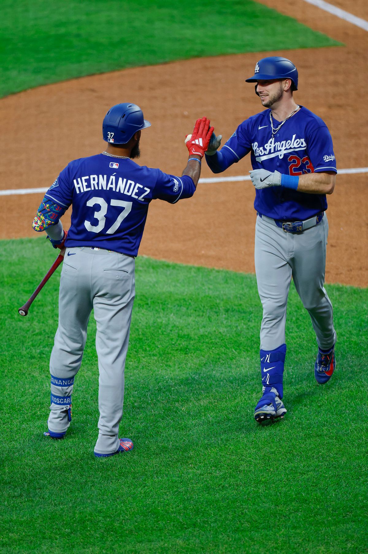 Kyle Tucker #23 of the Los Angeles Dodgers celebrates a home run with Teoscar Hernandez #37 against the New York Mets at Citi Field on July 25, 2026 in New York, New York. Kyle Tucker #23 of the Los Angeles Dodgers celebrates a home run with Teoscar Hernandez #37 against the New York Mets at Citi Field on July 25, 2026 in New York, New York.