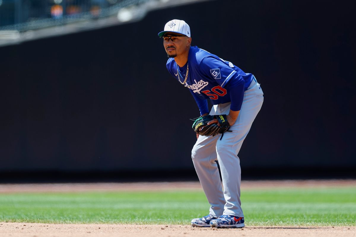 Mookie Betts #50 of the Los Angeles Dodgers in his defensive stance against the New York Mets at Citi Field on July 26, 2026 in New York, New York. Mookie Betts #50 of the Los Angeles Dodgers in his defensive stance against the New York Mets at Citi Field on July 26, 2026 in New York, New York.