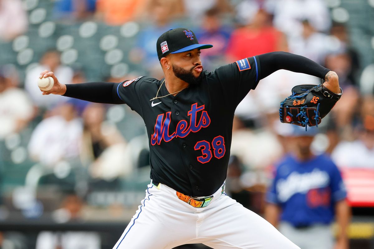 Devin Williams #38 of the New York Mets pitches against the Los Angeles Dodgers at Citi Field on July 26, 2026 in New York, New York. Devin Williams #38 of the New York Mets pitches against the Los Angeles Dodgers at Citi Field on July 26, 2026 in New York, New York.