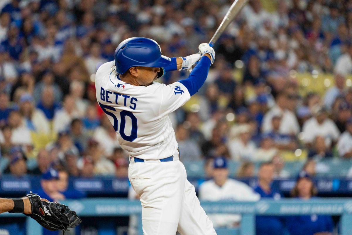 Mookie Betts #50 of the Los Angeles Dodgers hits a double and scores three during an MLB baseball game against the St. Louis Cardinals, Tuesday September 1st, 2026 in Los Angeles, California. 