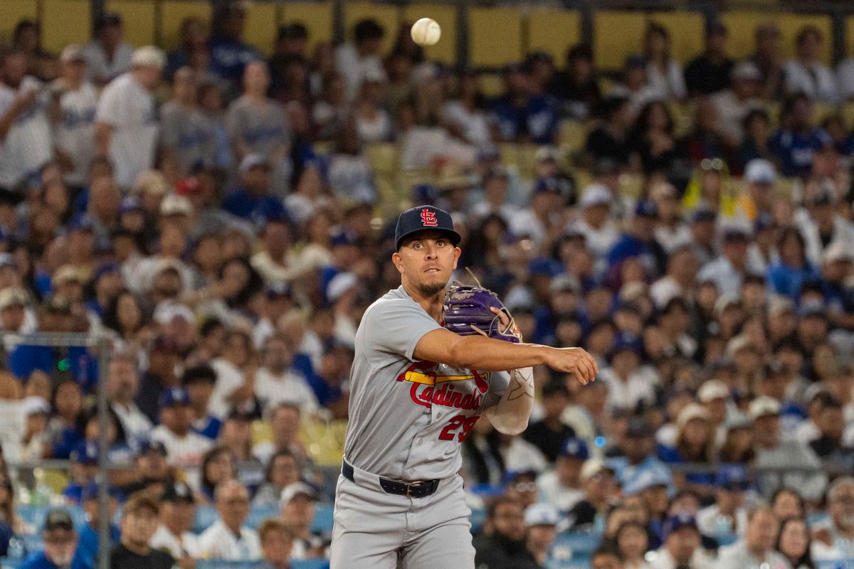 Ramon Urias #29 of the St. Louis Cardinals gets the out at first base during an MLB baseball game against the Los Angeles Dodgers, Tuesday September 1st, 2026 in Los Angeles, California.