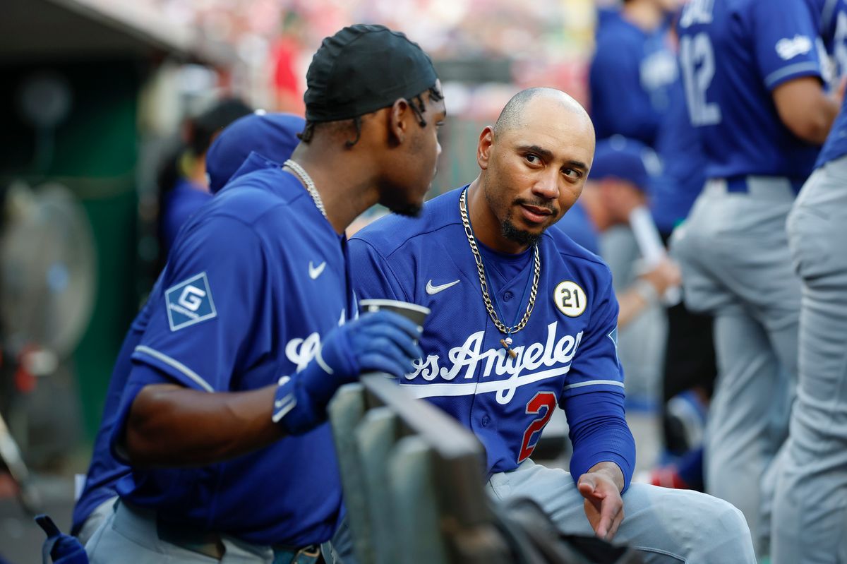 Mookie Betts #50 and Josue De Paula #95 of the Los Angeles Dodgers talk in the dugout at Great American Ball Park on September 15, 2026 in Cincinnati, Ohio. Mookie Betts #50 and Josue De Paula #95 of the Los Angeles Dodgers talk in the dugout at Great American Ball Park on September 15, 2026 in Cincinnati, Ohio.