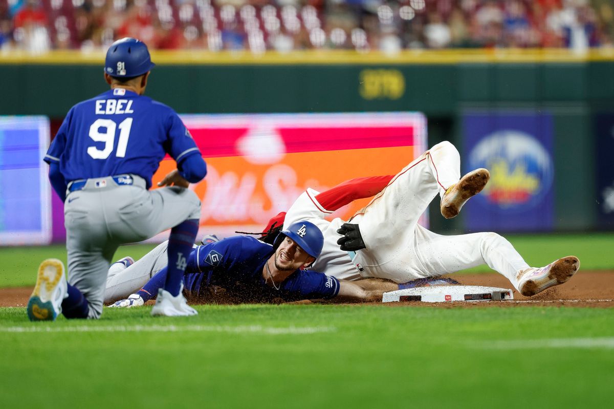 Elly De La Cruz #44 of the Cincinnati Reds tags out Kyle Tucker #23 of the Los Angeles Dodgers at Great American Ball Park on September 15, 2026 in Cincinnati, Ohio. Elly De La Cruz #44 of the Cincinnati Reds tags out Kyle Tucker #23 of the Los Angeles Dodgers at Great American Ball Park on September 15, 2026 in Cincinnati, Ohio.