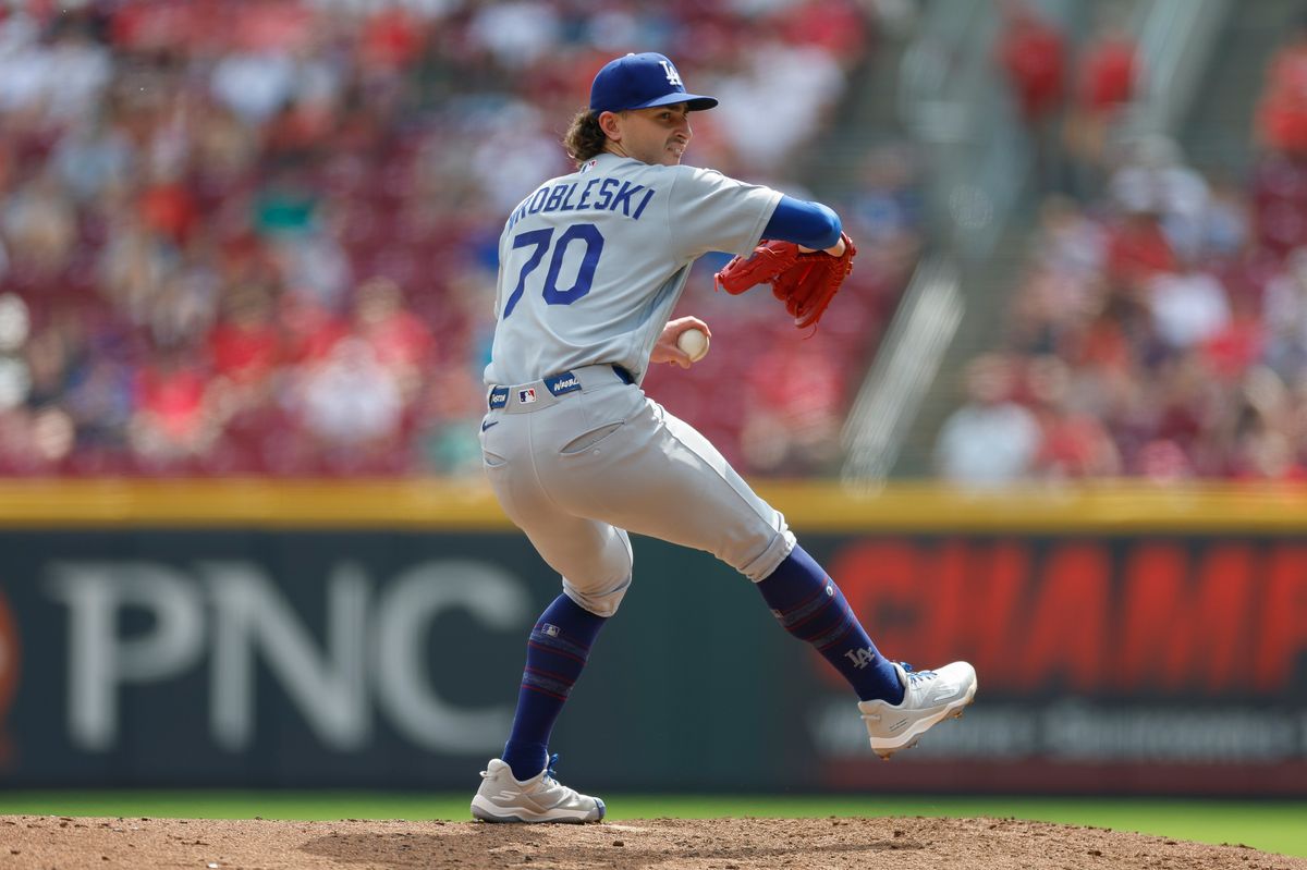 Justin Wrobleski #70 of the Los Angeles Dodgers throws a pitch against the Cincinnati Reds at Great American Ball Park on September 17, 2026 in Cincinnati, Ohio. Justin Wrobleski #70 of the Los Angeles Dodgers throws a pitch against the Cincinnati Reds at Great American Ball Park on September 17, 2026 in Cincinnati, Ohio.