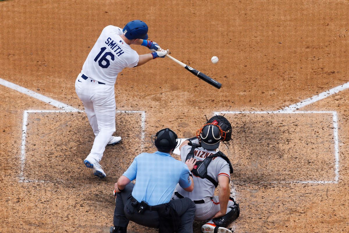 Will Smith #16 of the Los Angeles Dodgers hits during the game against the San Francisco Giants at Dodger Stadium on September 20, 2026 in Los Angeles, California. Will Smith #16 of the Los Angeles Dodgers hits during the game against the San Francisco Giants at Dodger Stadium on September 20, 2026 in Los Angeles, California.
