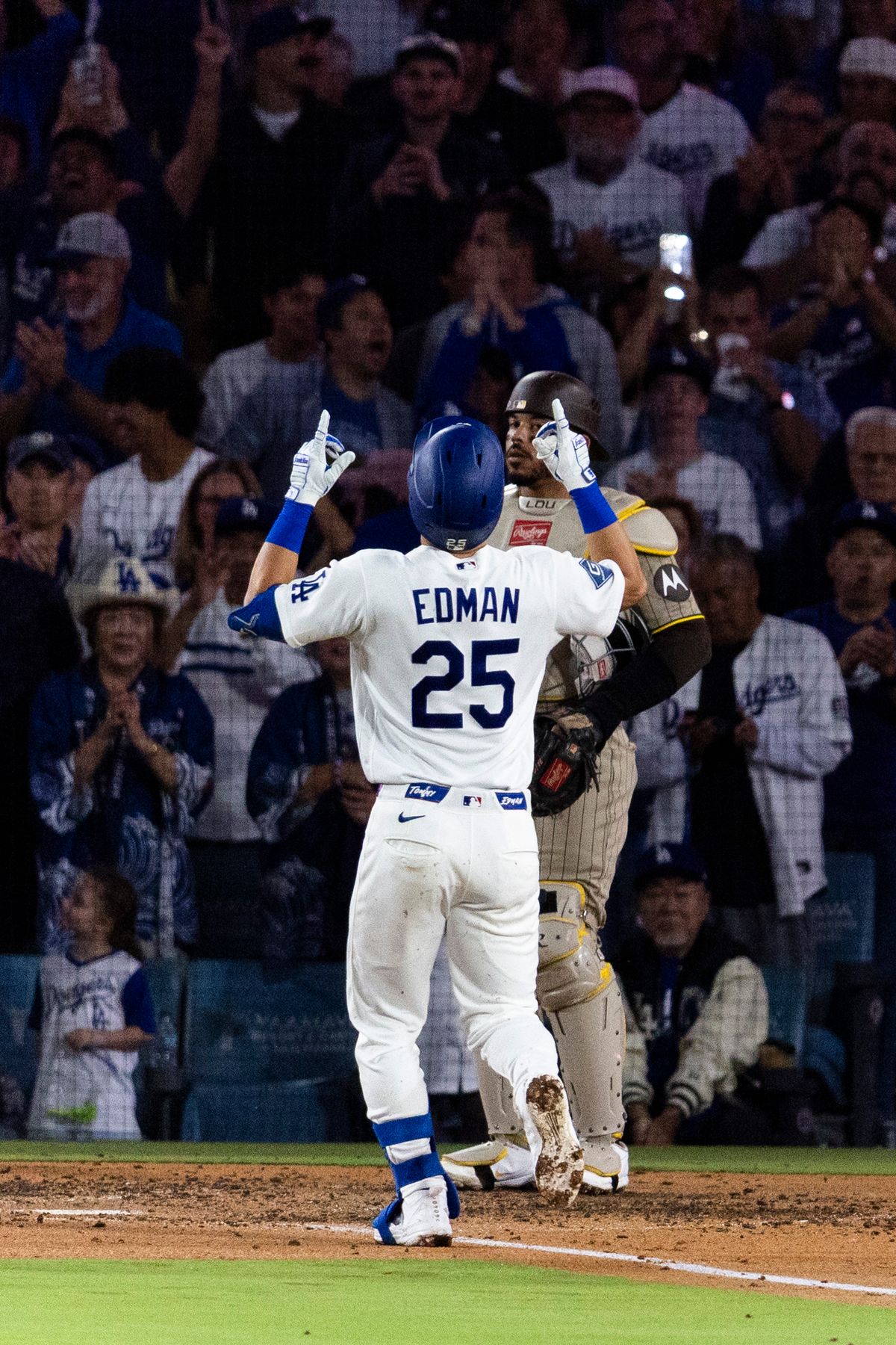 Los Angeles Dodgers second baseman Tommy Edman (25) celebrates a home run during a MLB baseball game against the San Diego Padres, Tuesday September 22, 2026 in Los Angeles, California. Los Angeles Dodgers second baseman Tommy Edman (25) celebrates a home run during a MLB baseball game against the San Diego Padres, Tuesday September 22, 2026 in Los Angeles, California.