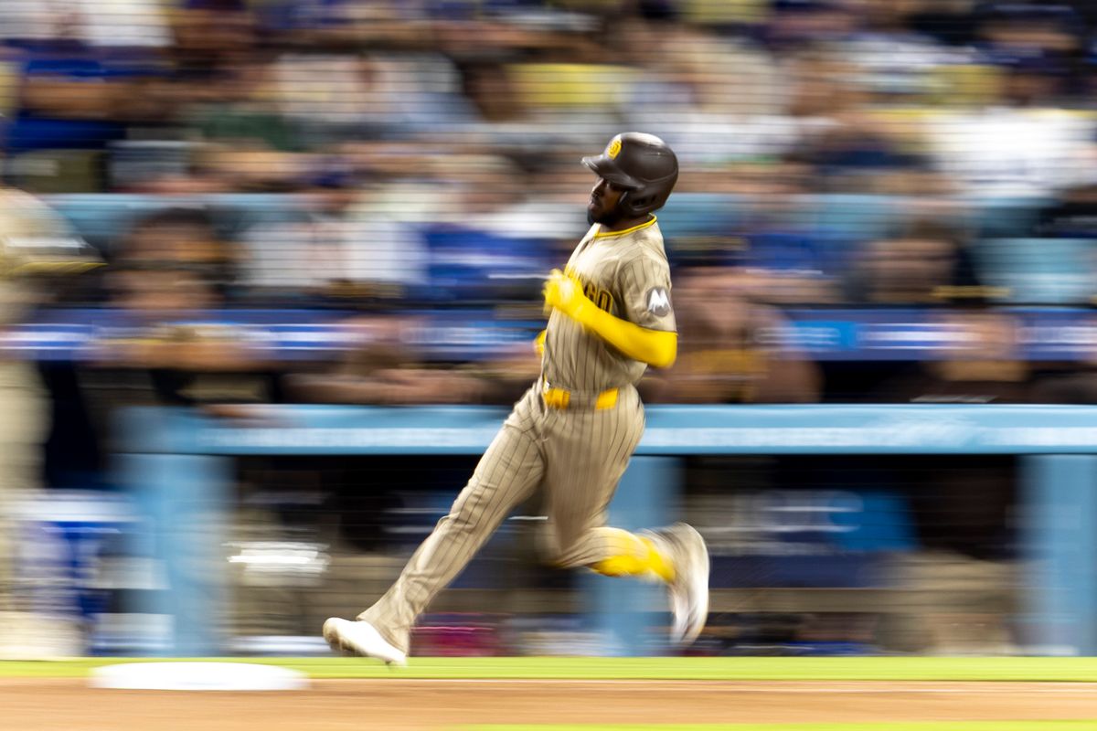 San Diego Padres left fielder Samad Taylor (0) runs to first base during a MLB baseball game against the Los Angeles Dodgers, Tuesday September 22, 2026 in Los Angeles, California. San Diego Padres left fielder Samad Taylor (0) runs to first base during a MLB baseball game against the Los Angeles Dodgers, Tuesday September 22, 2026 in Los Angeles, California.
