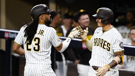 Aug 11, 2026; San Diego, California, USA; San Diego Padres right fielder Fernando Tatis Jr. (23) is congratulated by third baseman Manny Machado (13) after hitting a solo home run during the fourth inning against the Milwaukee Brewers at Petco Park.