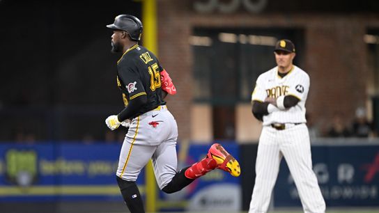 Aug 25, 2026; San Diego, California, USA; Pittsburgh Pirates center fielder Oneil Cruz (15) rounds the bases in front of San Diego Padres third baseman Manny Machado (13) after hitting a solo home run during the ninth inning at Petco Park.