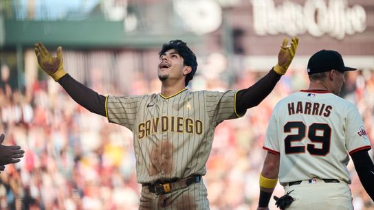 San Diego Padres catcher Ethan Salas (8) reacts at third base after hitting a triple against San Francisco Giants starting pitcher Logan Webb (not pictured) during the fourth inning at Oracle Park. San Diego Padres catcher Ethan Salas (8) reacts at third base after hitting a triple against San Francisco Giants starting pitcher Logan Webb (not pictured) during the fourth inning at Oracle Park.