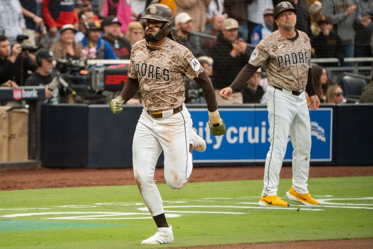 San Diego Padres Outfielder, Fernando Tatis Jr. (23), sprints home during an MLB Baseball game against the Atlanta Braves at Petco Park in San Diego, CA, on March 30, 2025. San Diego Padres Outfielder, Fernando Tatis Jr. (23), sprints home during an MLB Baseball game against the Atlanta Braves at Petco Park in San Diego, CA, on March 30, 2025.