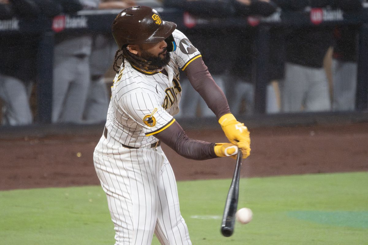 San Diego Padres Outfielder, Fernando Tatis Jr. (23), lines an RBI single to center field during an MLB Baseball game against the Cleveland Guardians at Petco Park in San Diego, CA, on March 31, 2025. San Diego Padres Outfielder, Fernando Tatis Jr. (23), lines an RBI single to center field during an MLB Baseball game against the Cleveland Guardians at Petco Park in San Diego, CA, on March 31, 2025.