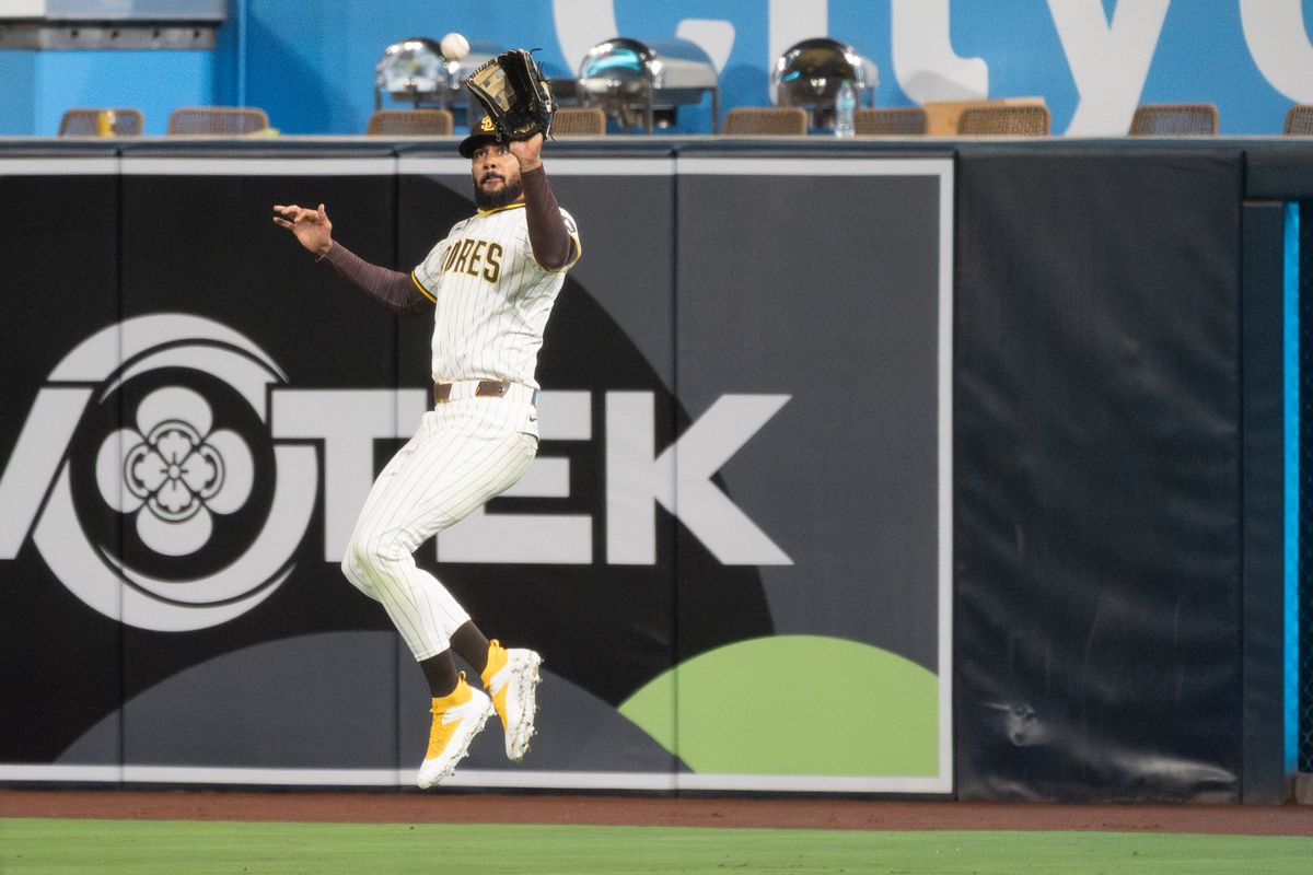 San Diego Padres Outfielder, Fernando Tatis Jr. (23), catches a line drive during an MLB Baseball game against the Cleveland Guardians at Petco Park in San Diego, CA, on March 31, 2025. San Diego Padres Outfielder, Fernando Tatis Jr. (23), catches a line drive during an MLB Baseball game against the Cleveland Guardians at Petco Park in San Diego, CA, on March 31, 2025.