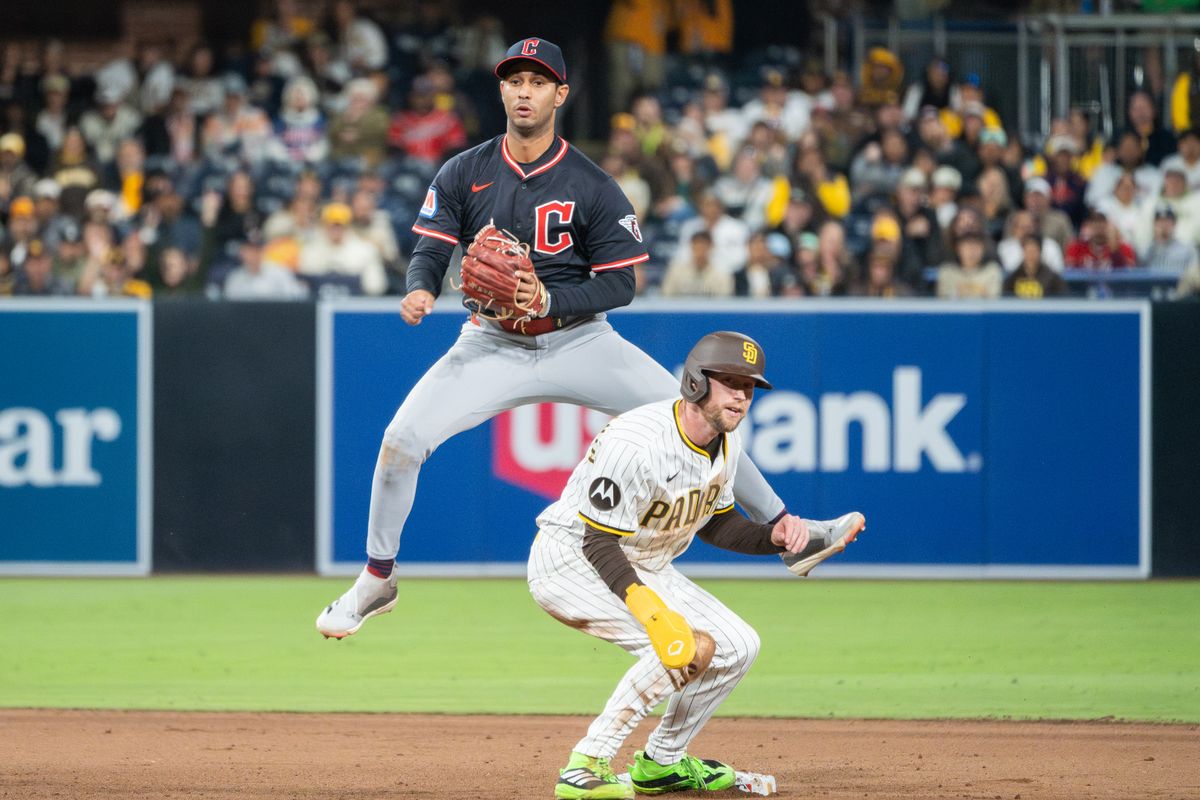 Cleveland Guardians Second Baseman, Gabriel Arias (13), attempts to get the force out at second as San Diego Padres Infielder, Jake Cronenworth (9), slides in safely during an MLB Baseball game at Petco Park in San Diego, CA, on April 1, 2025. Cleveland Guardians Second Baseman, Gabriel Arias (13), attempts to get the force out at second as San Diego Padres Infielder, Jake Cronenworth (9), slides in safely during an MLB Baseball game at Petco Park in San Diego, CA, on April 1, 2025.