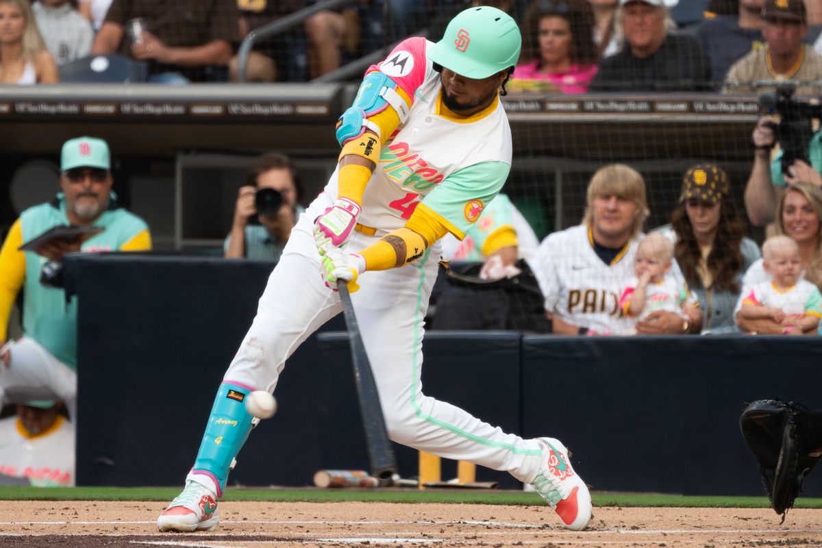 San Diego Padres infielder Luis Arraez (3) hits the ball during an MLB game against the Kansas City Royals on June 20, 2025 at Petco Park in San Diego, CA.
