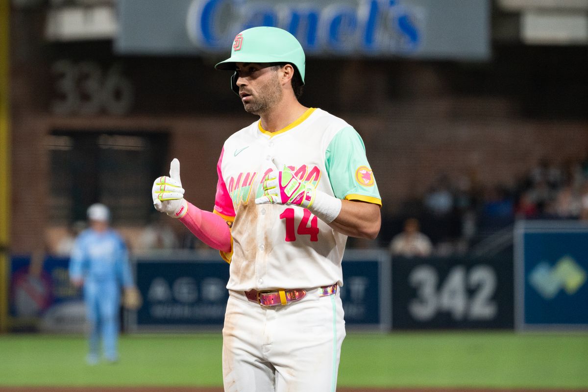 San Diego Padres infielder Tyler Wade (14) celebrates after hitting a single during an MLB game against the Kansas City Royals on June 20, 2025 at Petco Park in San Diego, CA.