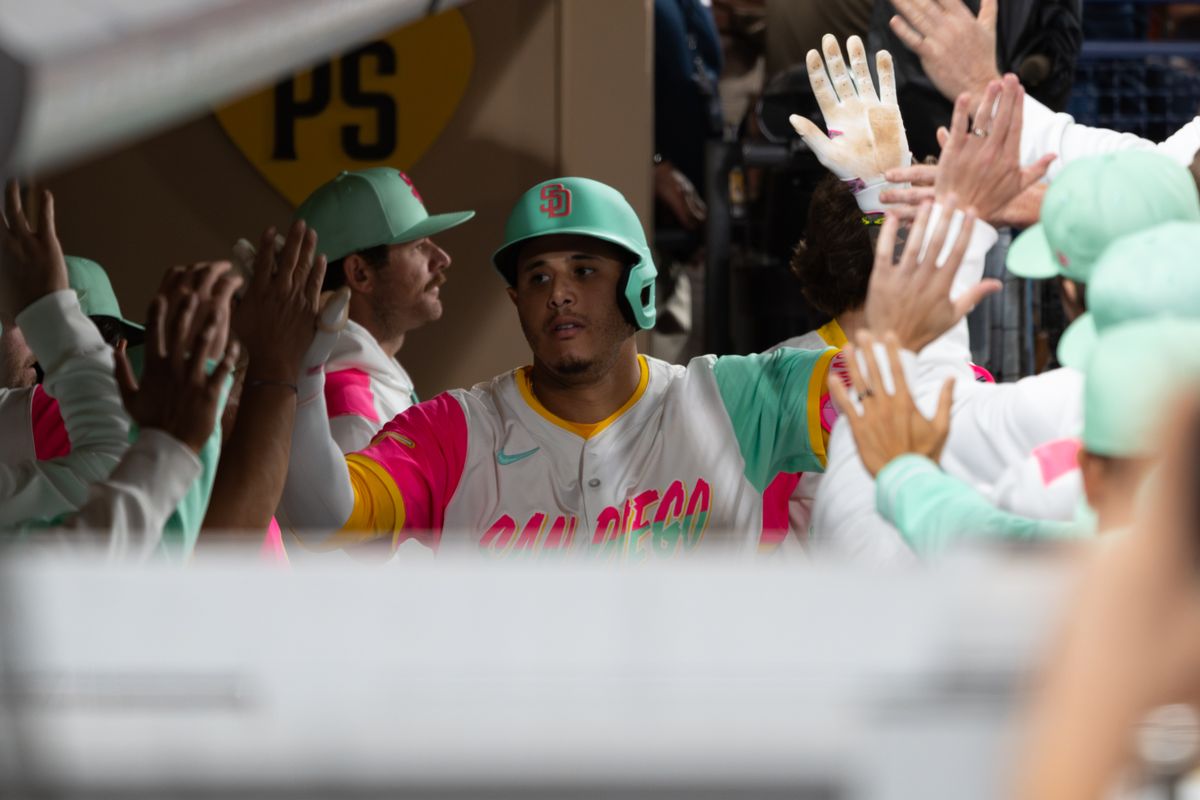 San Diego Padres third baseman Manny Machado (13) celebrates after hitting a home run during an MLB game against the Kansas City Royals on June 20, 2025 at Petco Park in San Diego, CA.