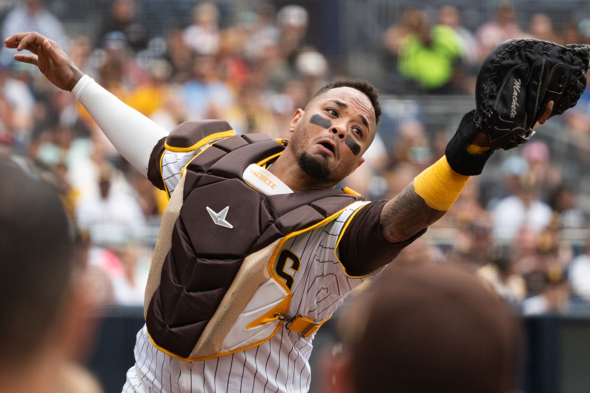 San Diego Padres catcher Martín Maldonado (15) catches the ball during an MLB game against the Kansas City Royals on June 21, 2025 at Petco Park in San Diego, CA.