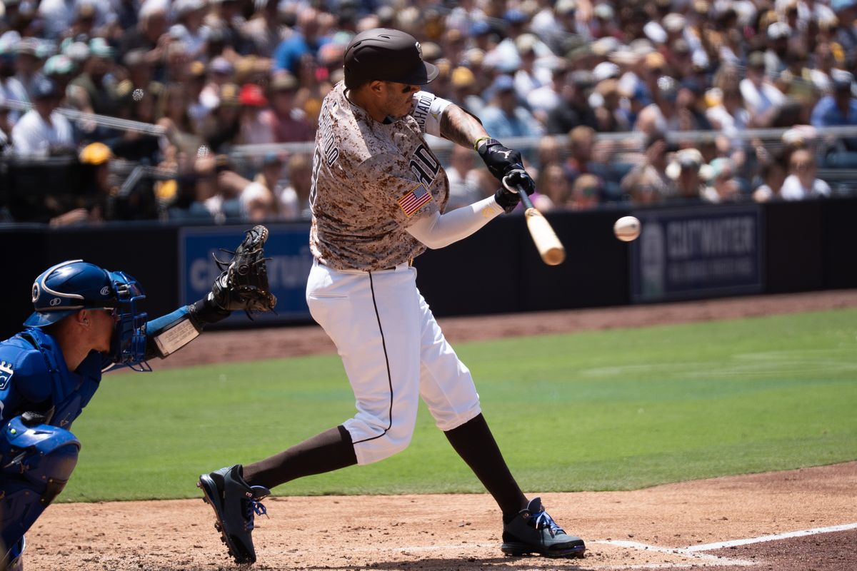 San Diego Padres third baseman Manny Machado (13) hits the ball during an MLB game against the Kansas City Royals on June 22, 2025 at Petco Park in San Diego, CA. San Diego Padres third baseman Manny Machado (13) hits the ball during an MLB game against the Kansas City Royals on June 22, 2025 at Petco Park in San Diego, CA.