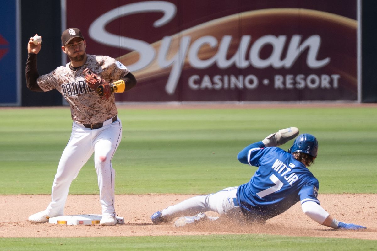 San Diego Padres infielder José Iglesias (7) turns a double play during an MLB game against the Kansas City Royals on June 22, 2025 at Petco Park in San Diego, CA. San Diego Padres infielder José Iglesias (7) turns a double play during an MLB game against the Kansas City Royals on June 22, 2025 at Petco Park in San Diego, CA.