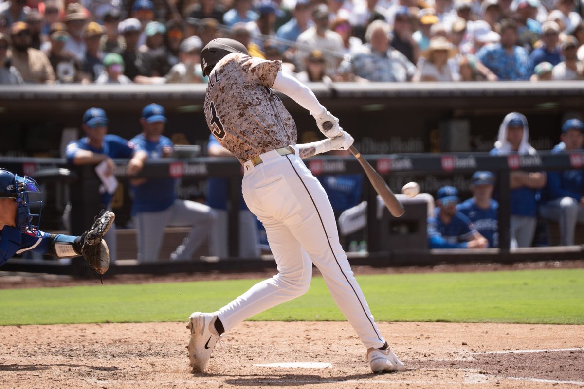 San Diego Padres outfielder Jackson Merril (3) hits the ball during an MLB game against the Kansas City Royals on June 22, 2025 at Petco Park in San Diego, CA. San Diego Padres outfielder Jackson Merril (3) hits the ball during an MLB game against the Kansas City Royals on June 22, 2025 at Petco Park in San Diego, CA.
