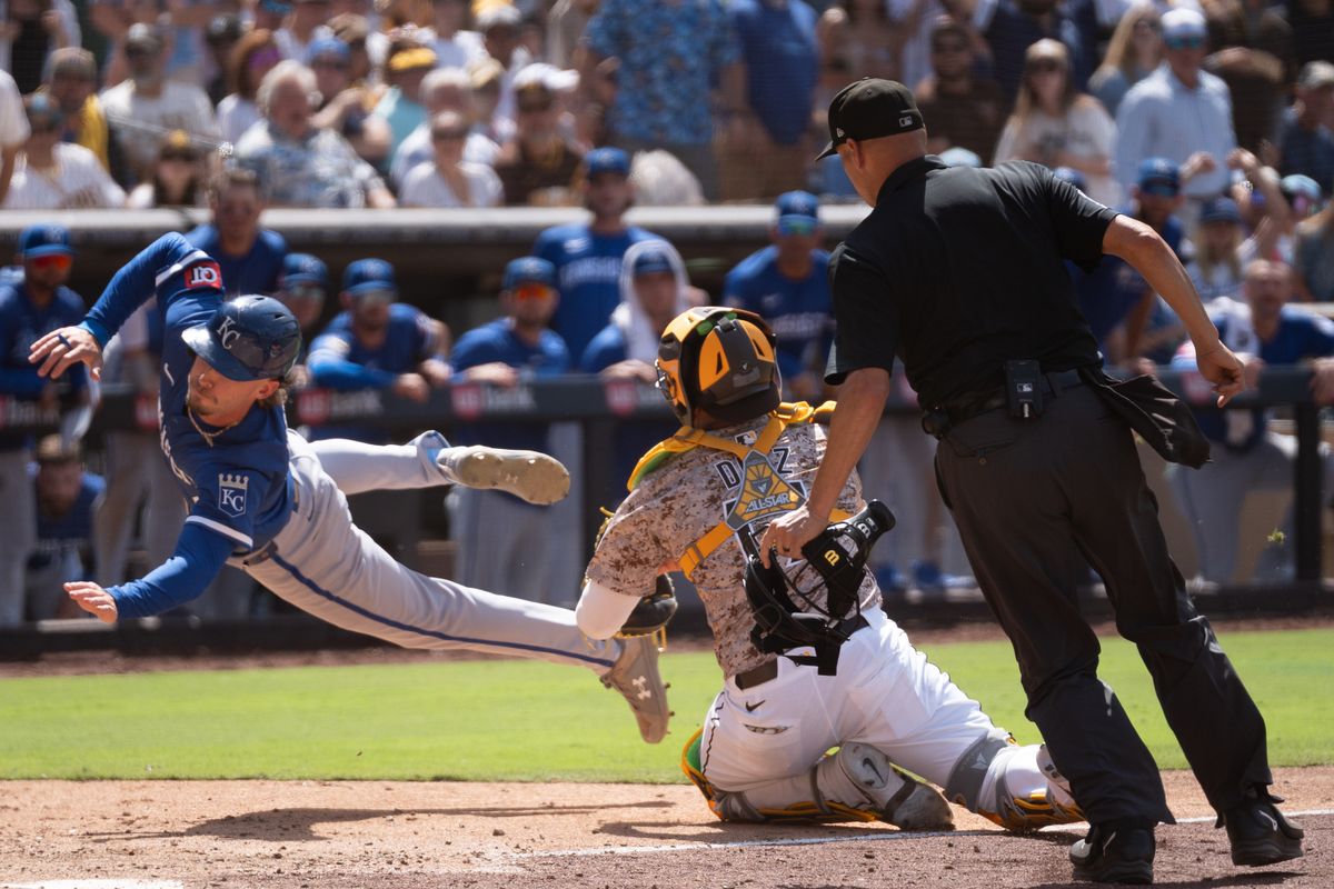 San Diego Padres catcher Elias Díaz (17) tags out Kansas City Royals outfielder Drew Waters (8) during an MLB game on June 22, 2025 at Petco Park in San Diego, CA. San Diego Padres catcher Elias Díaz (17) tags out Kansas City Royals outfielder Drew Waters (8) during an MLB game on June 22, 2025 at Petco Park in San Diego, CA.