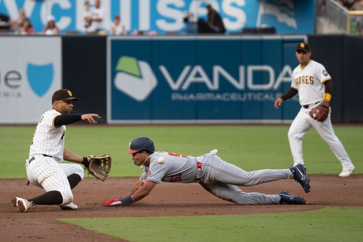 San Diego Padres shortstop Xander Bogaerts (2) tags a runner attempting to steal second base during an MLB game against the Washington Nationals on June 23, 2025 at Petco Park in San Diego, CA.