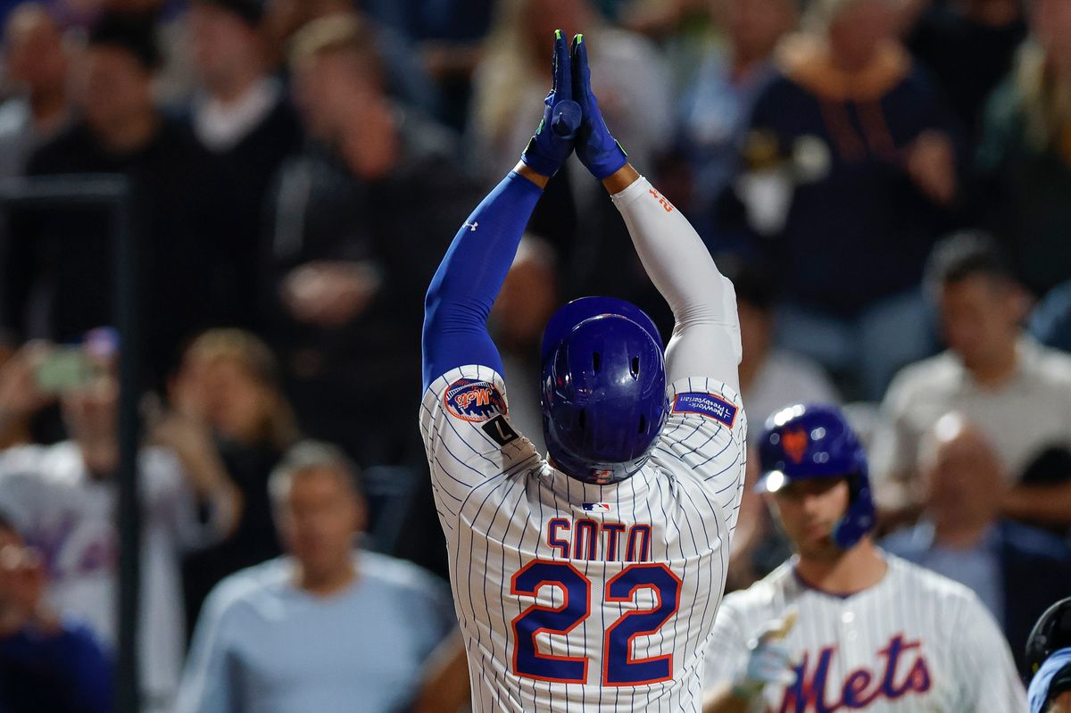 Juan Soto #22 hits a home run against the Padres at Citi Field on September 17, 2025 in New York.