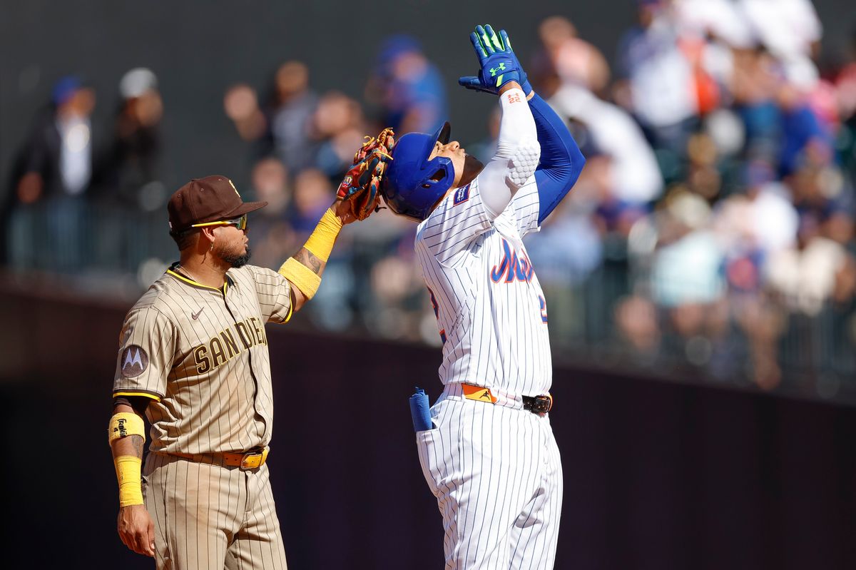 Juan Soto #22 hits a double against the Padres at Citi Field on September 18, 2025 in New York.