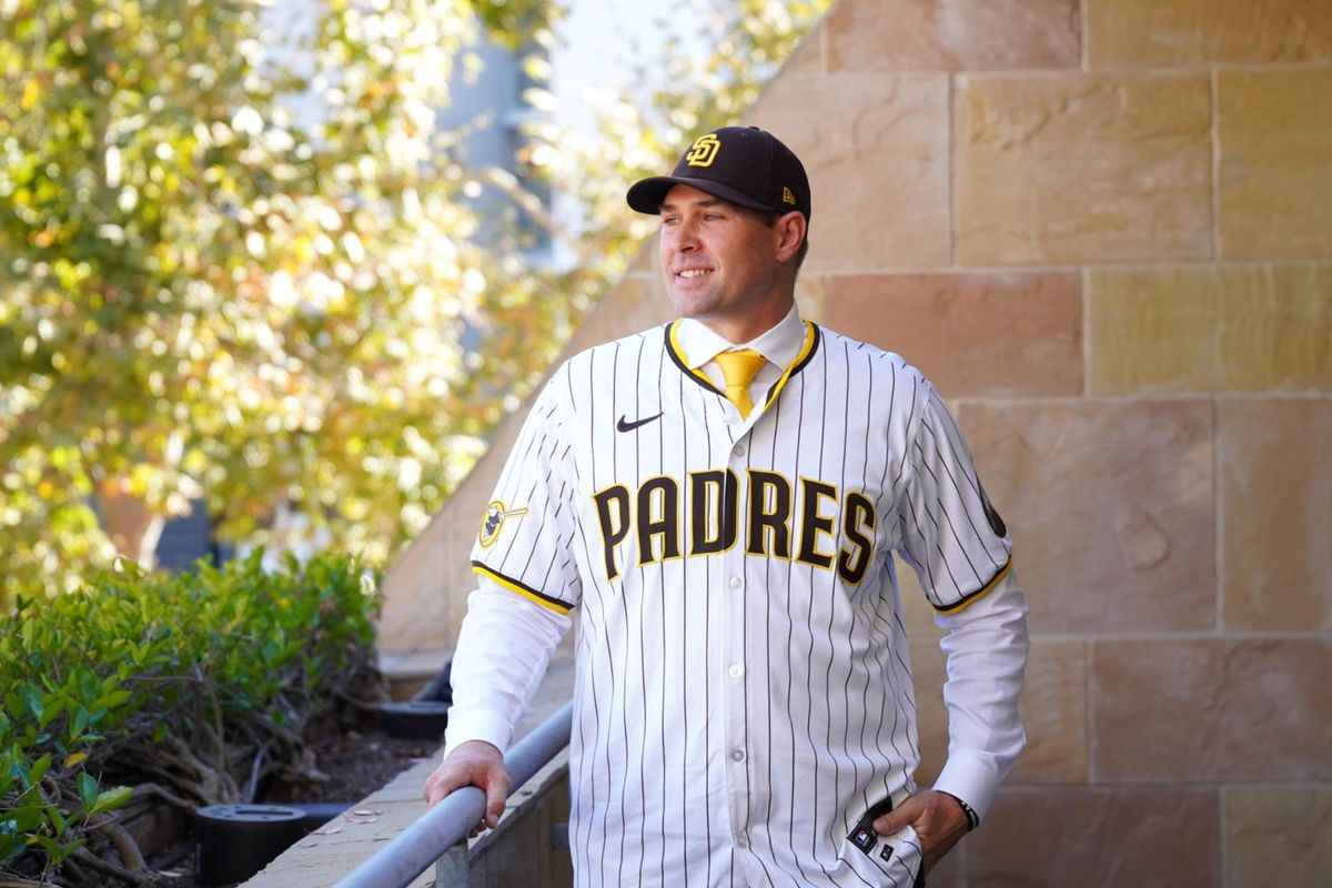 Craig Stammen poses for media after he is introduced as the new Padres manager, Monday November 10, 2025 in San Diego, Calif.