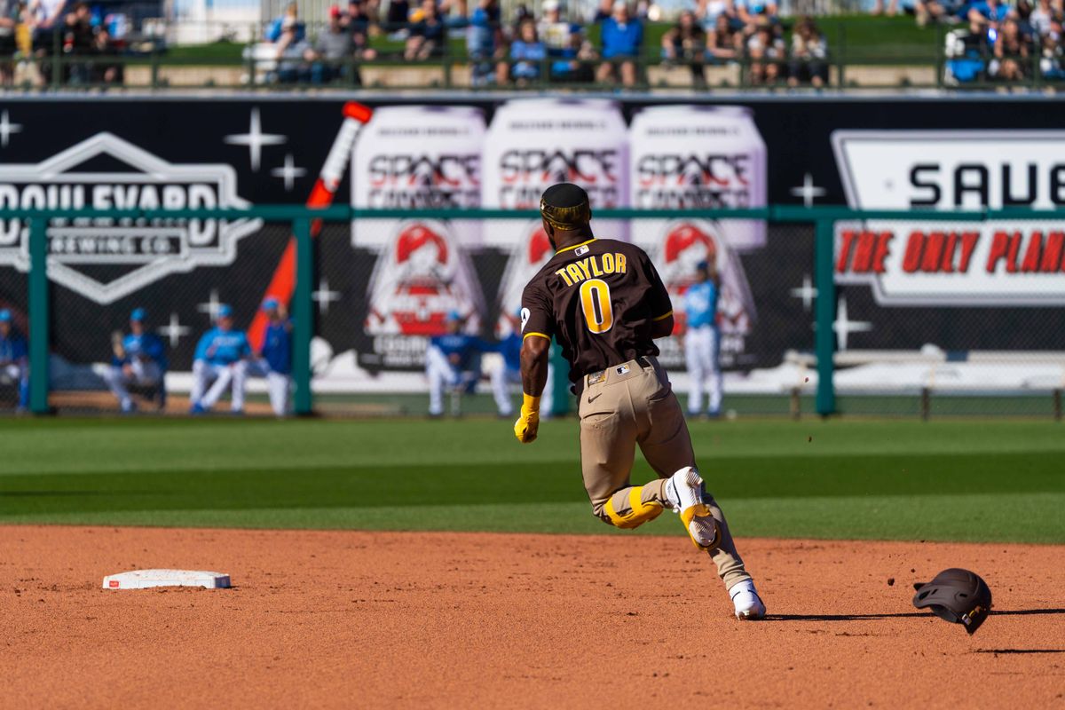 San Diego Padres infielder Samad Taylor (0) rounds second during an MLB Spring Training game between the San Diego Padres and the Kansas City Royals, Saturday February 21, 2026 at Surprise Stadium in Surprise, AZ. San Diego Padres infielder Samad Taylor (0) rounds second during an MLB Spring Training game between the San Diego Padres and the Kansas City Royals, Saturday February 21, 2026 at Surprise Stadium in Surprise, AZ.