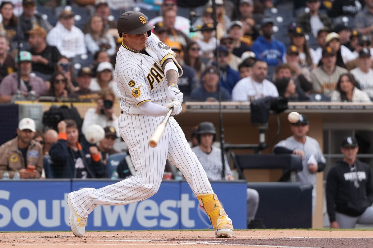 Padres third baseman Manny Machado (13) swings the bat during an MLB baseball game against the White Sox, Saturday May 02, 2026 in San Diego, California.
