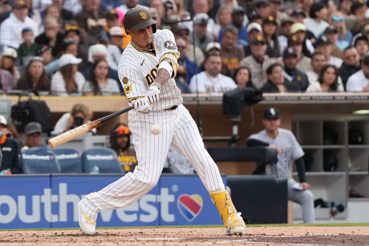 Padres third baseman Manny Machado (13) swings the bat during an MLB baseball game against the White Sox, Saturday May 02, 2026 in San Diego, California.