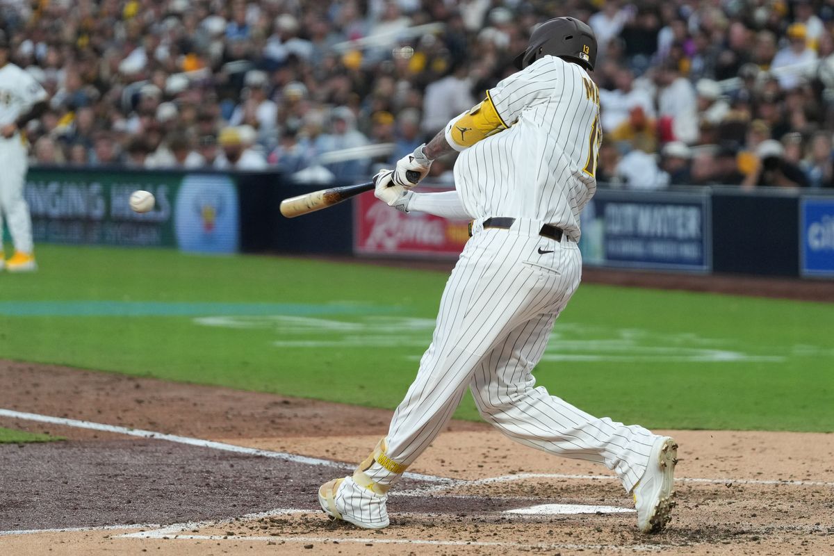 Padres third baseman Manny Machado (13) swings the bat during an MLB baseball game against the White Sox, Saturday May 02, 2026 in San Diego, California.